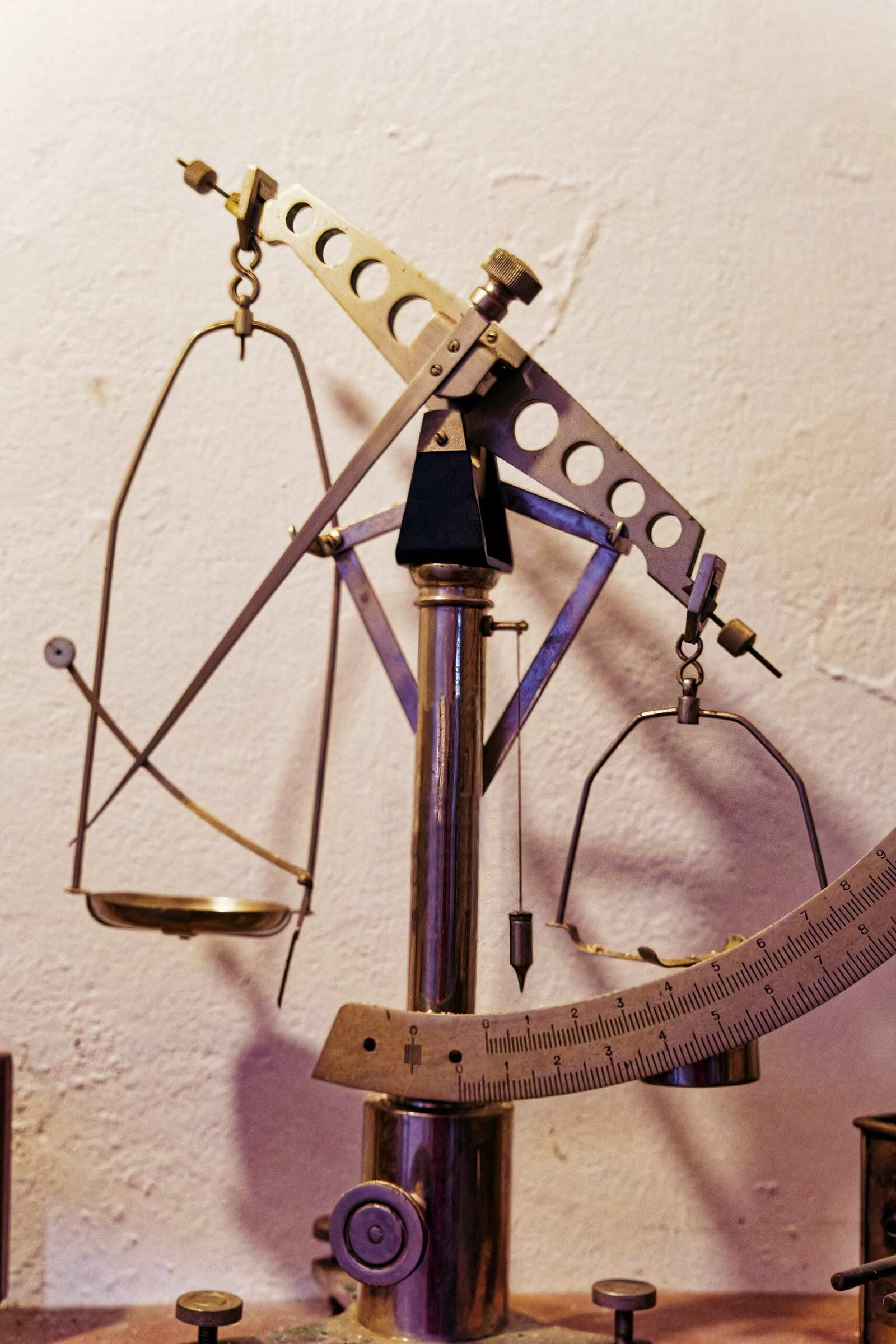 A large metal object sitting on top of a wooden table